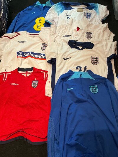 England Football Leisure Shirt Collection:  All different styles in mixed sizes in good condition. (19)