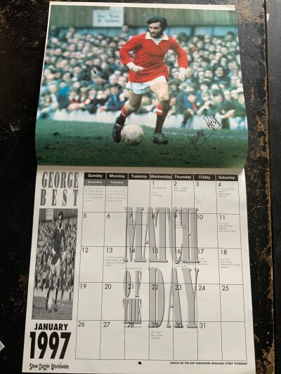 George Best Signed Football Calendar: Match of the day seventies superstars calendar for 1997. Each month features an action just over 12 x 10 inches of a 70s legend. This calendar is signed by Best and the original plastic cover confirms this.