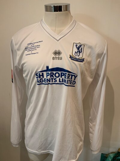 2011 - 2012 Enfield v Tottenham Match Worn Football Shirt: Enfield home long sleeve number 3 shirt worn v Tottenham in the opening match at the Queen Elizabeth stadium. Front states match details v Tottenham.