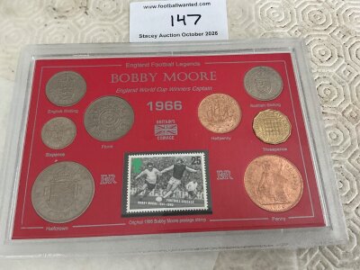 1966 World Cup Final Programme + Coins: Original final programme for England v West Germany match with England team filled in plus unwritten tournament programme. C/W 1966 coin set with all 8 circulated coins having 1966 as their date. Coin set was produced in 1993 and is dedicated to Bobby Moore with postage stamp. (3)