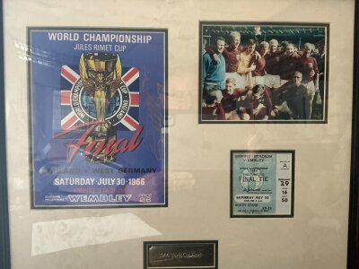 Geoff Hurst Signed 1966 England World Cup Display: Reproduction programme photo and ticket with programme hand signed by World Cup hatrick hero Geoff Hurst. Framed and glazed so not for posting. Instructions to sell.