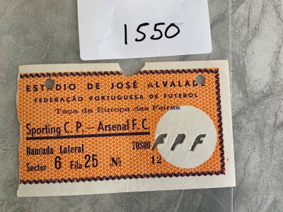 1969/70 Sporting Club De Portugal v Arsenal Fairs Cup Football Ticket: Tiny piece torn off at top for entry and two punch holes. Rare item.