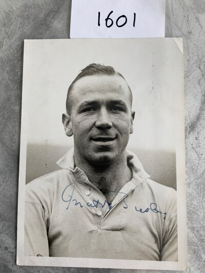Matt Busby Signed Football Press Photo: 8 x 6 original black and white press photo with press stamp to rear and annotation stating Manchester City 1934. Hand signed without dedication.