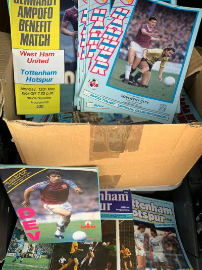 Tottenham + West Ham Football Programmes: Large quantity of home programmes mainly from the 1980s. 470 x Tottenham + 139 West Ham. 3 boxes with instructions to sell.