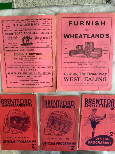 Brentford 1930s Home Football Programmes: 32/33 Orient fair, 34/35 Bolton good, 35/36 Stoke re stapled, 37/38 Arsenal with a few autographs inside, 38/39 Arsenal with word Arsenal written to cover. (5)