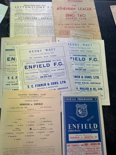 Enfield Football Programme Collection: Contained in collectors folder with some historic matches. There are 6 from the 40s including 1947 Athenian League v Sing Tao Hong Kong. 10 from the 50s and more. C/W memorabilia regarding the 1967 Maurice Norman testimonial and 3 press photos.
