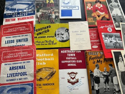 Football Memorabilia Boxes: Includes, handbooks, brochures, trade cards, cup final song sheets, Charles Buchans magazines and much more. 2 boxes with instructions to sell.
