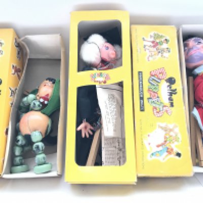 A Collection of Pelham Puppets including Baby Dragon. Schoolmaster. Magician. Ned the Mule.. Rabbit. poodle. Gretal and Tyrolean Boy.
