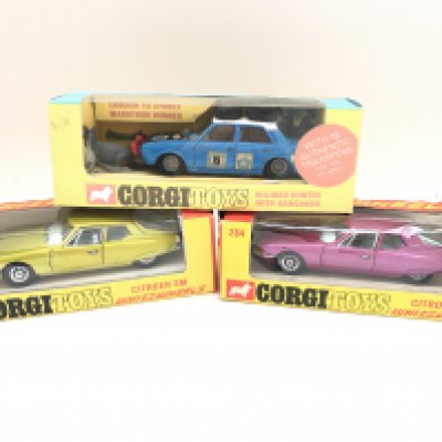 3 Boxed Corgi Vehicles including 2 Citroen SM #284 and a Hillman Hunter With Kangaroo in Repro box #302.