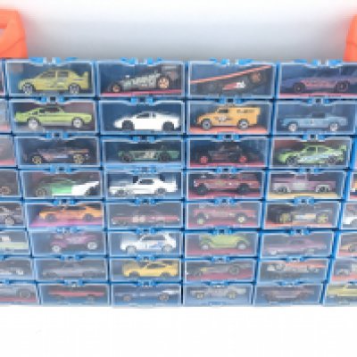 A Collection of Hot Wheels Cars In a multibrick Car Case. No Reserve.