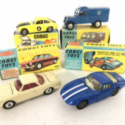 A Boxed Corgi Volkswagen 1500 Karmann Ghia #239. A Boxed Marcos 1800 G.T. #324. A MGB GT #345 and a RAC Radio Rescue Land-Rover #416. No Reserve.