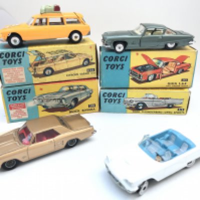 A Collection of 4 Boxed Corgi Vehicles a Citroen Safari #436. A Ghia L.6.4 #241. A Buick Rivera #245 and a Ford Thunderbird-Open Sports #215. No Resrve.