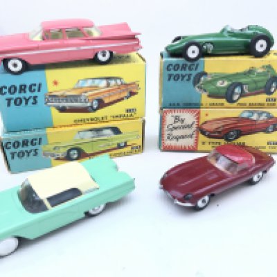 A Boxed Corgi Chevrolet Impala #220. A BRM Formula 1 Grand Prix Racing Car #152. A E Type Jaguar #307.. And a Ford Thunderbird #214. No Reserve.