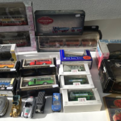 A collection in excess of 20 mostly boxed diecast model vehicles by various manufacturers including Corgi..Burago..EFE. Etc. No reserve