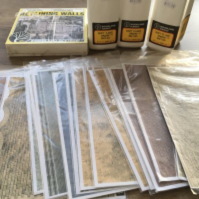 A grouping of new materials used in creating model scenes such as a railway scene. Includes 16 packages of super quick building paper. No reserve
