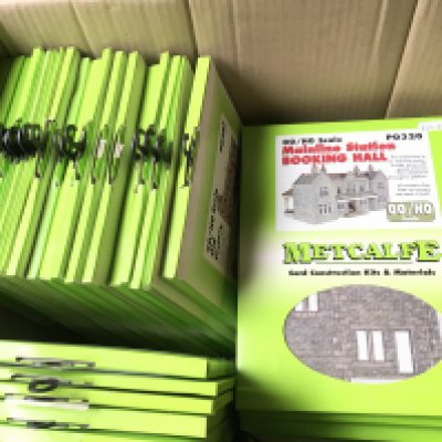 A collection of approximately 60 Metcalfe Card Construction Kits including Retaining walls..engine sheds..shops etc all unopened. 00 scale. No reserve