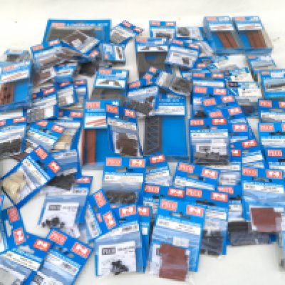 A collection of Approximately 70 N gauge model railway accessories by PECO..including assorted Rolling Stock Accessories and Lineside Kits . All are unopened in original packaging. No reserve