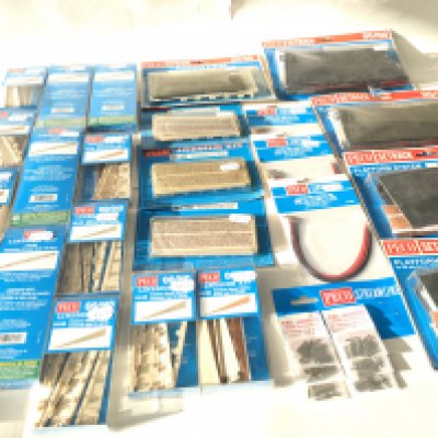 A collection of of PECO model railway accessories 00 gauge includes Lineside kits ..Platform system and Lectrics etc. all unopened in original packaging. No reserve