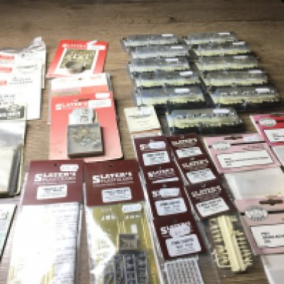 A collection in excess of 30 new unopened accessories for model railway N scale. Manufacturers include Bachmann..Slaters plus others. No reserve