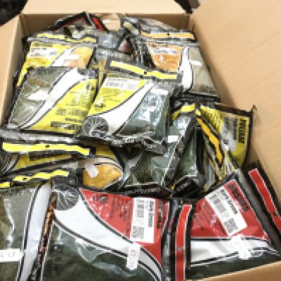 A large box contains an assortment of Woodland Scenics modelling materials for creating layout scenes such as model railways. No reserve