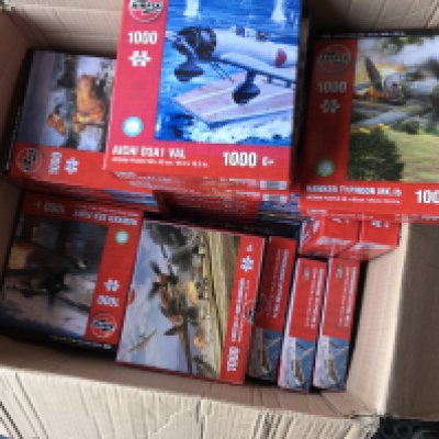 A collection of approximately 35 new boxed puzzles by Airfix mostly 1000 piece. Theme Is military warplanes. Includes a 3000 piece Spitfire. No reserve