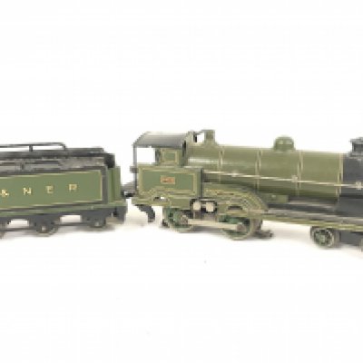 3 Boxes Containing 0 Gauge 3-Rail Loco. Track. Tunnels Stations. Buildings and Accessories.