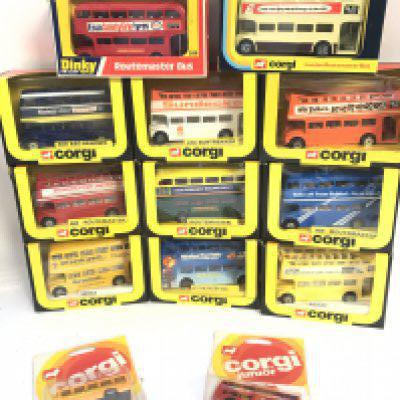 A Collection of Boxed Matchbox. Corgi and other Buses. In Various States. And a a Collection of Catalogs.