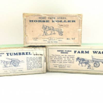 3 Boxed Vintage Britains. A Tumbrel #4F. A Horse Roller #9F and a Farm Wagon #5F.