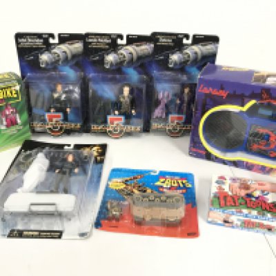 A Collection of Carded Babylon 5 Figures. A Power Rangers Thunder Bike (No Gun). A Spider Man Cassette Player. X-Files. A Sealed Tops Tat-Toons Pack etc. No Reserve.