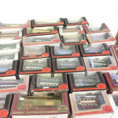 A collection of 28 boxed diecast vehicles mostly buses by Exclusive First jEditions. All in original display boxes. No reserve