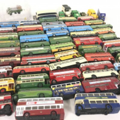 A collection in excess of 60 diecast model vehicles..mostly buses all without boxes. No reserve