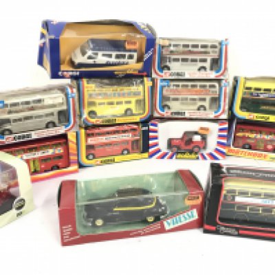 A Collection Of Boxed Diecast Buses. Trams and Others. No Reserve.