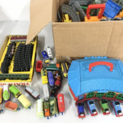 A battery operated train set. A Thomas tank engine collection of track, buildings and trains. No reserve