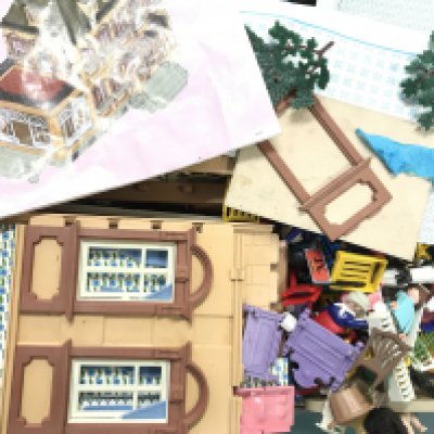 A Box Containing A Playmobil Grand Mansion. No Reserve.