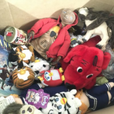 A box containing an assortment of toys including furbys..Star Wars..Disney chess set, chitty Chitty bang bang collectors edition dvd with model car. Plus others. No reserve.