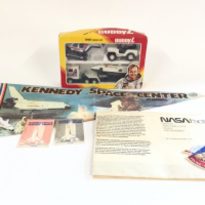 A box containing a NASA space set with additional accessories. Also a Boxed Superkings Matchbox K-21 as well as various other old Playworn vehicles to include Corgi and Matchbox.