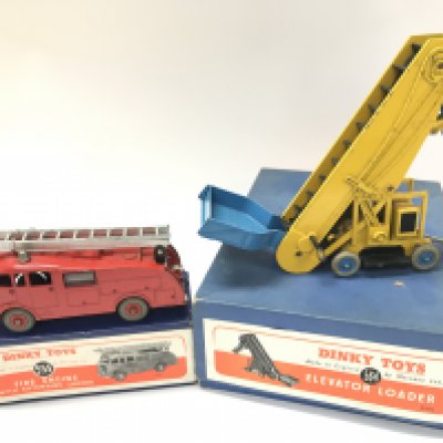 A Boxed Dinky Fire Engine #555 and a Elevator Loader #564.