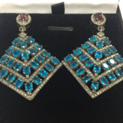 A pair of silver flared drop earrings set with oval apatites , round garnets and diamonds , boxed. Apatites 5.00ct approx . Garnet 0.45ct approx. Diamonds 1.00ct approx 
