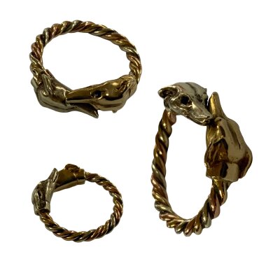 A Gents 9ct three tone gold Greyhound twist ring, size R. 10.6g total weight.