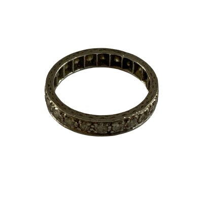 Platinum full eternity ring set with small Moissonite stones  , size K. 3.2g total weight.