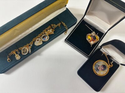 Three boxed Elvis jewellery pieces including two necklaces (one silver) and a bracelet
