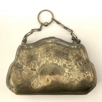 An Edwardian hallmarked silver purse. 123g.