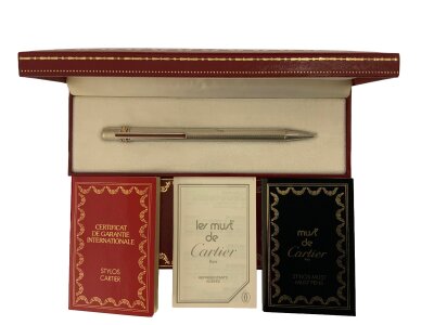 A vintage Must De Cartier biro, box and papers serial 498939.