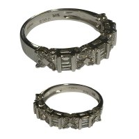 An 18ct white gold illusion set ring with a pattern of baguette and brilliant cut diamonds. N.