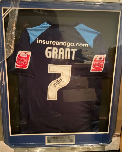Southend 2008 - 2009 Match Worn Framed Football Shirt: Worn by Grant and obtained directly from the players sponsor. Number 7 Grant to rear and signed to the number. Nicely framed and not for posting