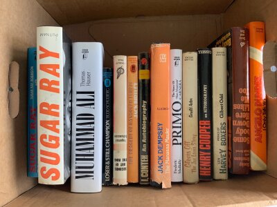 Boxing Book Collection: Older autobiographies and biographies to include Dundee Cooper Louis Carnera Dempsey Conteh Johansson Ali Sugar Ray Robinson and more. 14 books with instructions to sell.