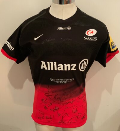 Saracens 2016 Multi Signed Match Prepared Rugby Shirt: Red and black short sleeve shirt. Multi signed to front by the team. Prepared for the final v Exeter on 28 May 2016
