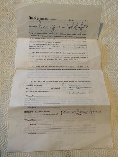 Wales Athlete + Rugby Player Contract: Thomas Berwyn Jones was a Welsh sprint athlete who also played Rugby Union + League including for Great Britain. This contract which he has signed is to play for Wakefield Trinity in the mid 60s. C/W some cuttings he kept.