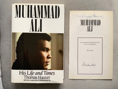 Muhammad Ali Signed Boxing Book Title Page: Single page from book named Muhammad Ali by Thomas Hauser signed by both. C/W hardback book that it relates to. Genuine item.
