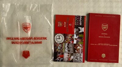 2005 - 2006 Arsenal Last Match Bound Football Programme: Ltd edition number 28 hand signed by Peter Hill-Wood. Excellent condition low numbered edition with accompanying brochure and bag for the famous match v Wigan.